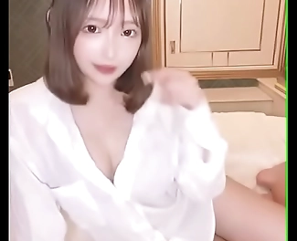 Innocent Enchantress in a Sheer White Y-Shirt: A Photogravure for Your Eyes Only